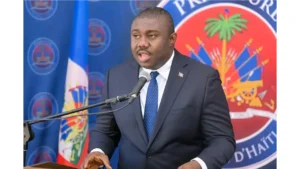 John Herrick Dessources, ministre du Tourisme, s'exprimant Lors de la 36ᵉ édition des Mardis de la Nation, le 20 février 2026. (Photo publiée par @PrimatureHT)