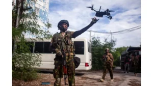 A drone is launched during a Haitian police operation against armed gangs in Port-au-Prince on 28 November 2024. Photograph: Patrice Noel/Zuma Press Wire/Rex/Shutterstock